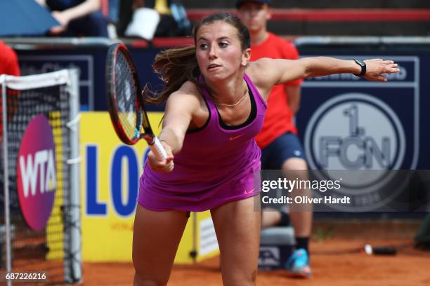 Annika Beck of Germany in action against Lena Rueffer of Germany in the first round during the WTA Nuernberger Versicherungscup on May 23, 2017 in...