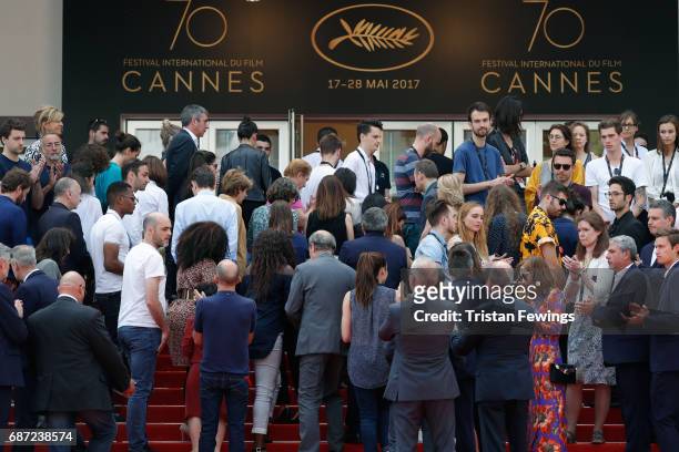 Director of the Cannes Film Festival Thierry Fremaux President of the Cannes Film Festival Pierre Lescure depart after leading a minute of silence...