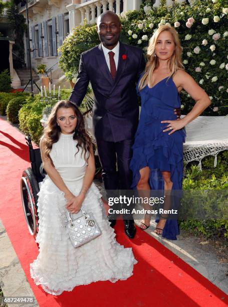 Actor Jimmy Jean-Louis with host Leopoldine Huyghues Despointes and Daya Fernandez attend the Artists for Peace and Justice cocktail event...