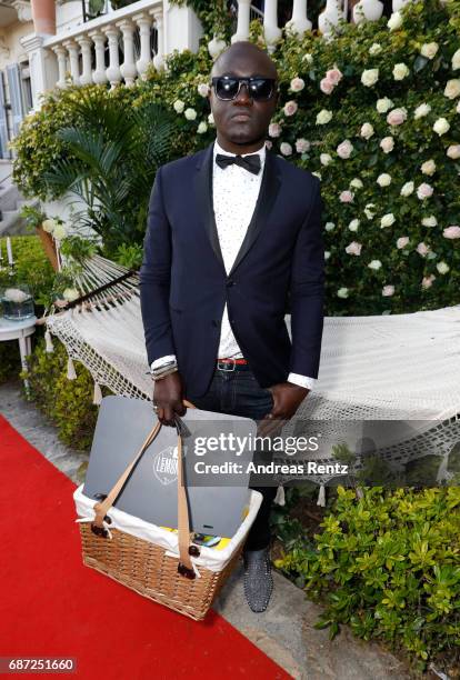 Harvey Ambomo attends the Artists for Peace and Justice cocktail event celebrating the 70th Annual Cannes Film Festival presented on the Lemon Lemon...