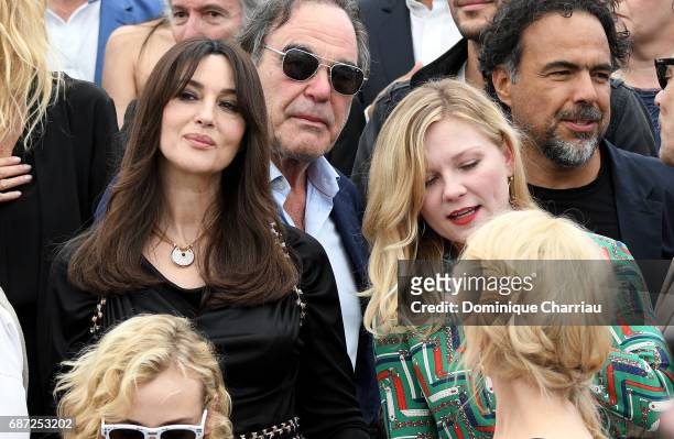 Monica Bellucci, Oliver Stone, Kirsten Dunst and Alejandro Gonzalez Inarritu attends the 70th Anniversary photocall during the 70th annual Cannes...