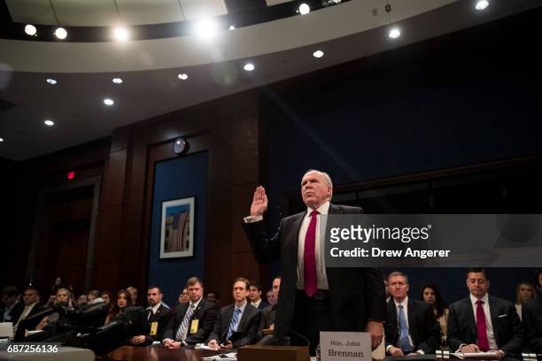 Former Director of the U.S. Central Intelligence Agency John Brennan is sworn in at the start of a hearing of the House Permanent Select Committee on...
