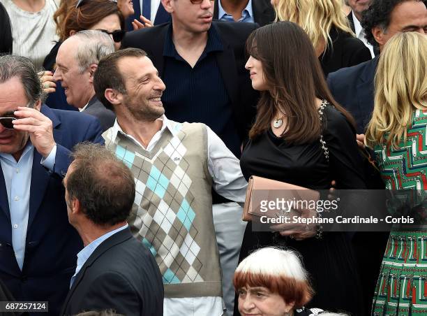 Monica Bellucci and Mathieu Kassovitz attend the 70th Anniversary photocall during the 70th annual Cannes Film Festival at Palais des Festivals on...