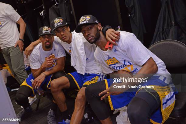 James Michael McAdoo, Patrick McCaw and Ian Clark of the Golden State Warriors pose for a photo after winning Game Four of the Western Conference...