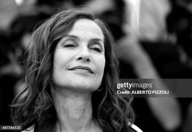 French actress Isabelle Huppert poses on May 21, 2017 during a photocall for the film 'Claire's Camera ' at the 70th edition of the Cannes Film...