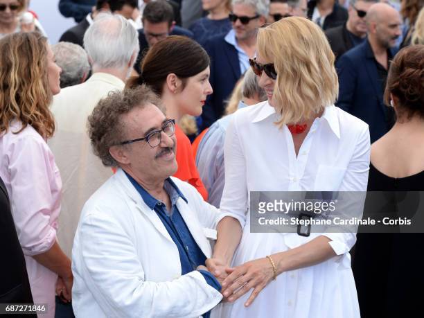 Ferid Boughedir and Uma Thurman attend the 70th Anniversary photocall during the 70th annual Cannes Film Festival at Palais des Festivals on May 23,...