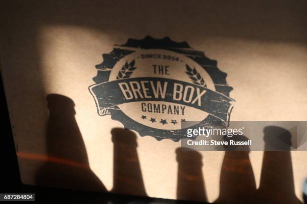 As the Shannon Rooney opens her box of beer at home that she recieved through a service called Brew Box. Craft breweries not able to get into the...