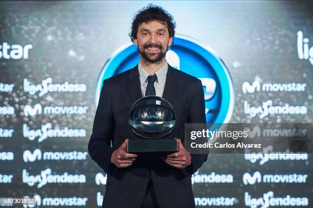 Spanish basketball player Sergio Llull of Real Madrid receives the 'MVP Movistar de la Liga Endesa 2016-2017' award at the Telefonica Las Tablas on...