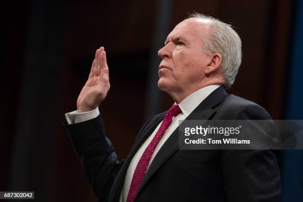 Former CIA director John Brennan is sworn in to testify before the House Intelligence Committee in the Capitol Visitor Center on Russian ties to the...