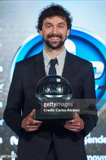 Spanish basketball player Sergio Llull of Real Madrid receives the 'MVP Movistar de la Liga Endesa 2016-2017' award at the Telefonica Las Tablas on...