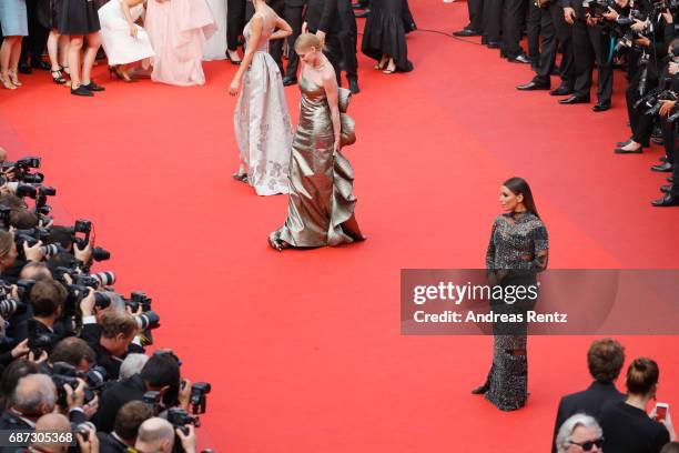 Svetlana Khodchenkova and Eva Longoria attend the 70th Anniversary of the 70th annual Cannes Film Festival at Palais des Festivals on May 23, 2017 in...