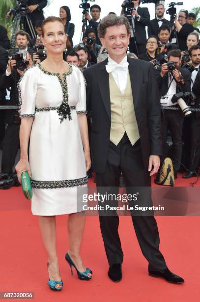 Carole Bouquet and Philippe Sereys de Rothschild attend the 70th Anniversary of the 70th annual Cannes Film Festival at Palais des Festivals on May...