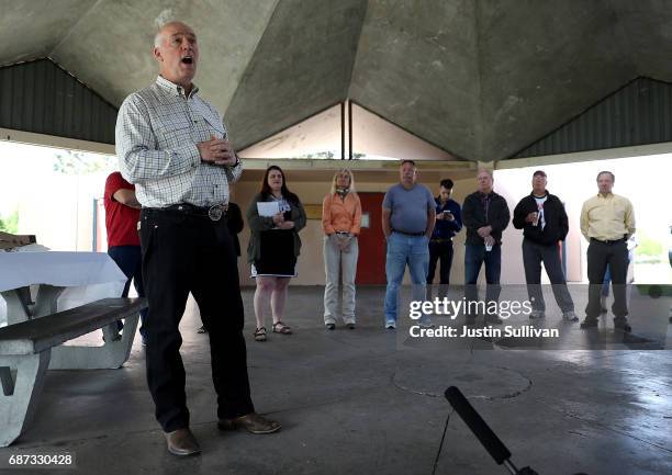 Republican congressional candidate Greg Gianforte speaks to supporters during a campaign meet and greet at Lions Park on May 23, 2017 in Great Falls,...