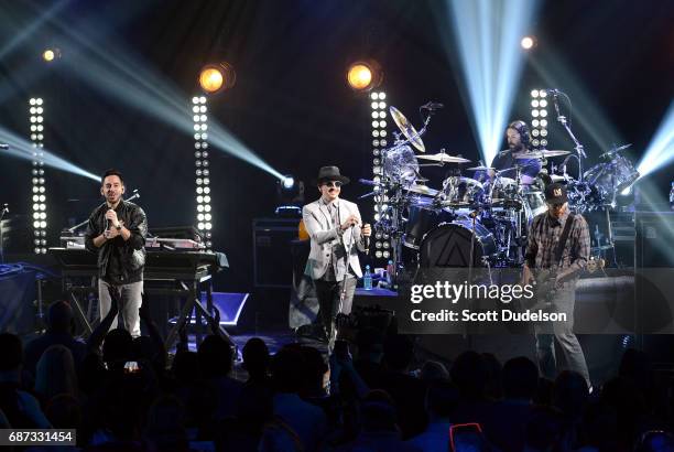 Musicians Mike Shinoda, Chester Bennington, Rob Bourdon and Dave Farrell of Linkin Park perform onstage during the band's "One More Light" album...