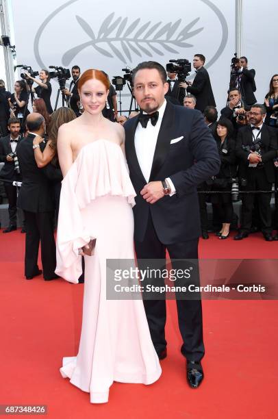 Barbara Meier and Klemens Hallmann attend the 70th Anniversary screening during the 70th annual Cannes Film Festival at Palais des Festivals on May...