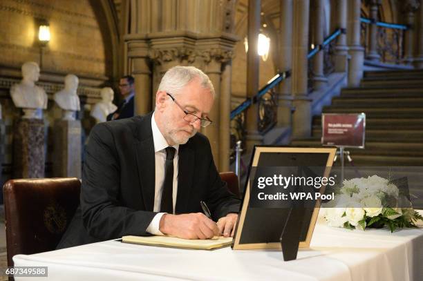 Labour leader Jeremy Corbyn signs a book of condolence at Manchester Town Hall on May 23, 2017 in Manchester, England. A 23-year-old man was arrested...