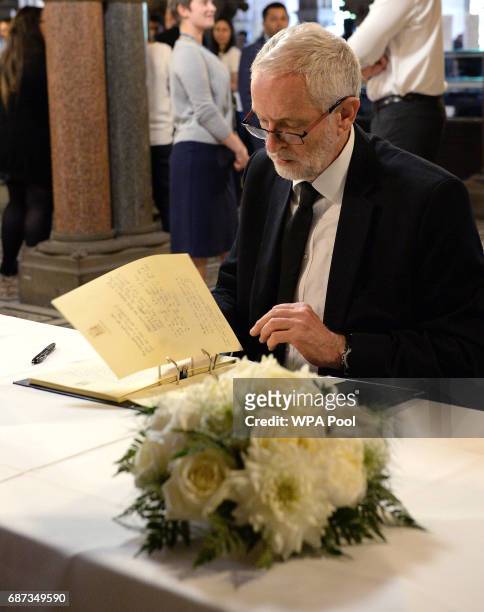 Labour leader Jeremy Corbyn signs a book of condolence at Manchester Town Hall on May 23, 2017 in Manchester, England. A 23-year-old man was arrested...