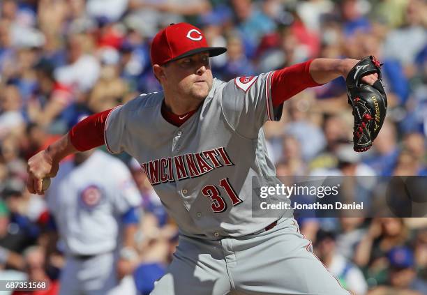 Drew Storen of the Cincinnati Reds pitches against the Chicago Cubs at Wrigley Field on May 18, 2017 in Chicago, Illinois. The Cubs defeated the Reds...