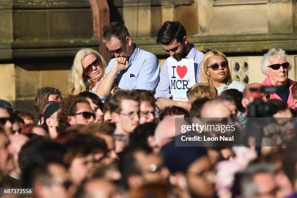 Members of the public gather at a candlelit vigil, to honour the victims of Monday evening's terror attack, at Albert Square on May 23, 2017 in...