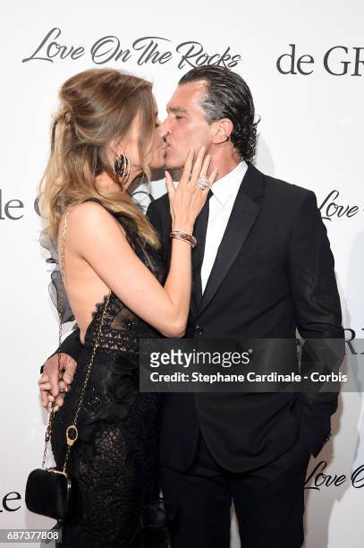 Nicole Kimpel and Antonio Banderas attend DeGrisogono "Love On The Rocks" during the 70th annual Cannes Film Festival at Hotel du Cap-Eden-Roc on May...