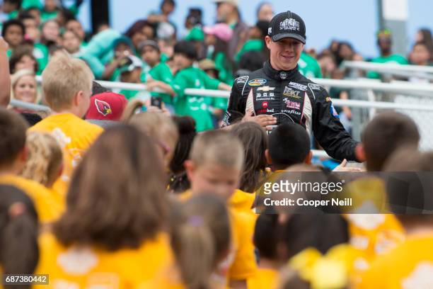 John Hunter Nemechek greets students during the Speeding to Read Assembly at Texas Motor Speedway on May 23, 2017 in Fort Worth, Texas.
