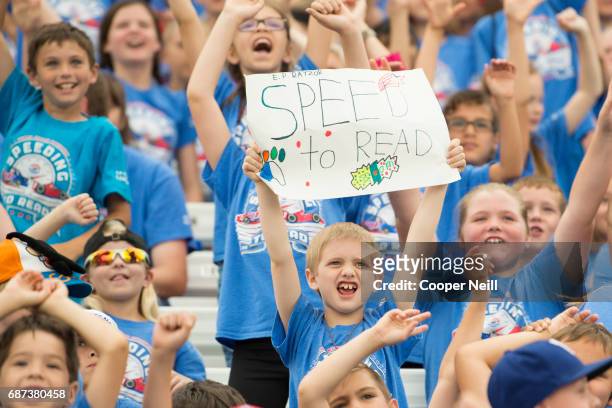 Students cheer for their school during the Speeding to Read Assembly at Texas Motor Speedway on May 23, 2017 in Fort Worth, Texas.