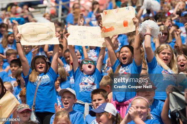 Students cheer for their school during the Speeding to Read Assembly at Texas Motor Speedway on May 23, 2017 in Fort Worth, Texas.