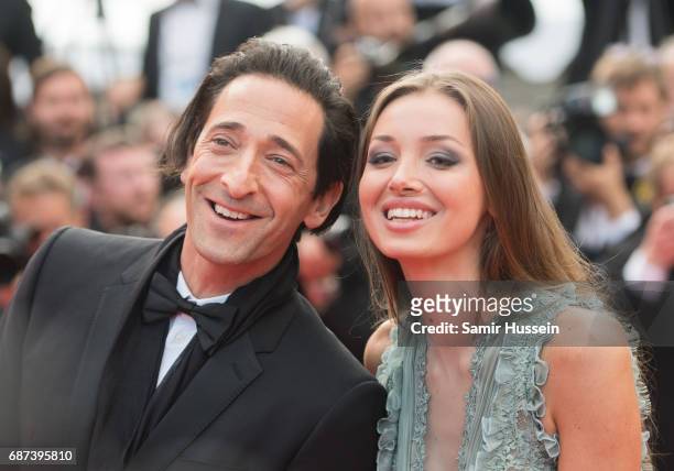 Lara Lieto and Adrien Brody attend the 70th Anniversary screening during the 70th annual Cannes Film Festival at Palais des Festivals on May 23, 2017...
