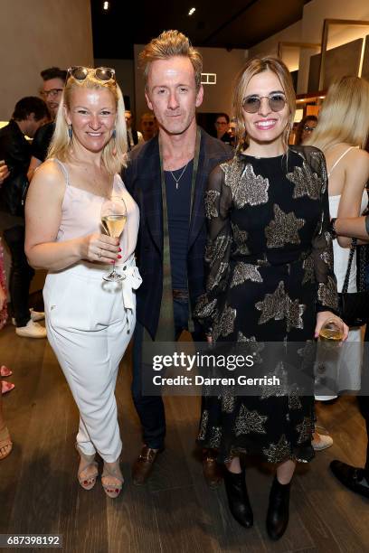 Katie Manderson, Tom Stubbs and Jessica Craig attend the 30 year anniversary Oliver Peoples celebration at The London Flagship on May 23, 2017 in...