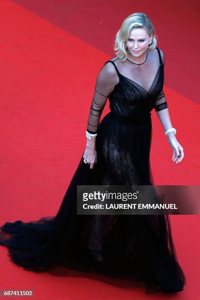 South African actress Charlize Theron arrives on May 23, 2017 for the '70th Anniversary' ceremony of the Cannes Film Festival in Cannes, southern...