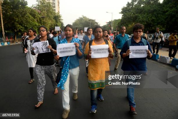 Indian Journalists take parts in a protest rally after assaulted by the Kolkata Police on Monday while covering clashes between police and the Left...