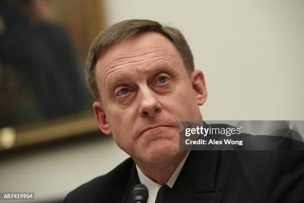 Adm. Michael Rogers, Director of National Security Agency and Commander of the U.S. Cyber Command, testifies during a hearing before the Emerging...