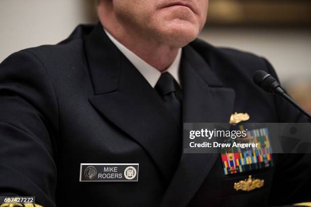 Admiral Michael Rogers, Director of the National Security Agency and commander of U.S. Cyber Command, testifies during a House Armed Services...