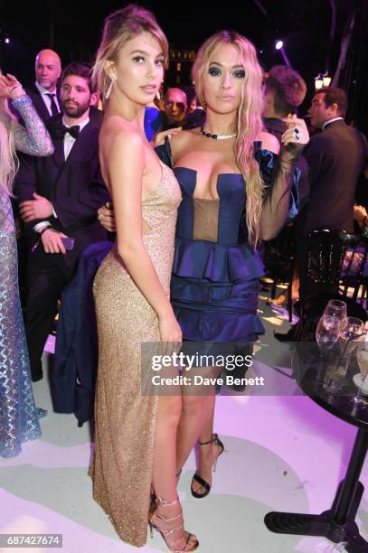 Camilla Marrone and Rita Ora attend the de Grisogono "Love On The Rocks" party during the 70th annual Cannes Film Festival at Hotel du Cap-Eden-Roc...