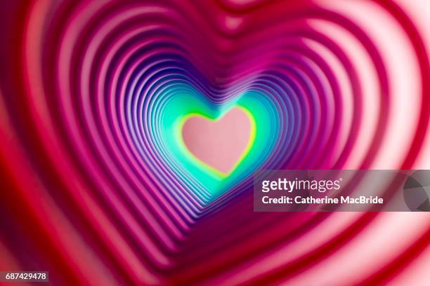 heart shaped rainbow tunnel - catherine macbride foto e immagini stock