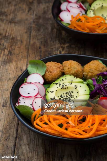 salad bowl with falafel and avocado - larissa veronesi bildbanksfoton och bilder