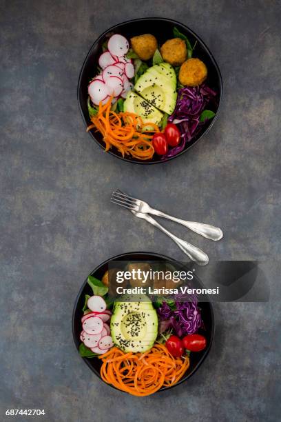 salad bowl with falafel and avocado - larissa veronesi bildbanksfoton och bilder