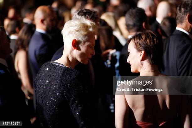 Tilda Swinton and Kristin Scott Thomas attends the 70th Anniversary of the 70th annual Cannes Film Festival at Palais des Festivals on May 23, 2017...