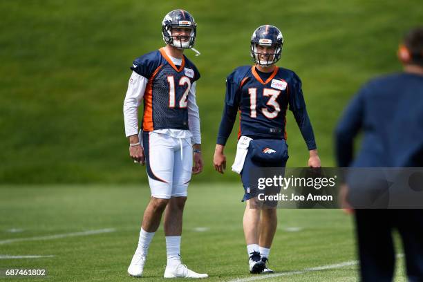 Quarterback's Paxton Lynch and Trevor Siemian of the Denver Broncos during the first week of OTAs at the UCHealth Training Center. May 23, 2017 in...