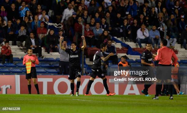 Argentina's Lanus player Alejandro Silva celebrates his goal against Uruguay's Nacional during their Libertadores Cup football match at the Parque...