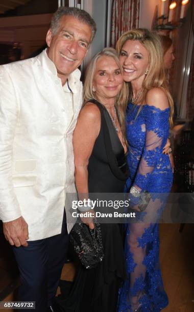 Steve Varsano, Tina Green and Lisa Tchenguiz attend the de Grisogono "Love On The Rocks" party during the 70th annual Cannes Film Festival at Hotel...