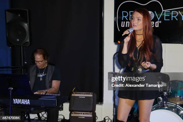 Richie Supa and Kendra Erika perform at Recovery Unplugged Treatment Center on May 23, 2017 in Ft. Lauderdale, Florida.