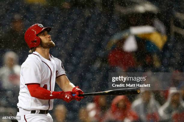 Bryce Harper of the Washington Nationals flies out against the Seattle Mariners for the second out of the third inning at Nationals Park on May 23,...