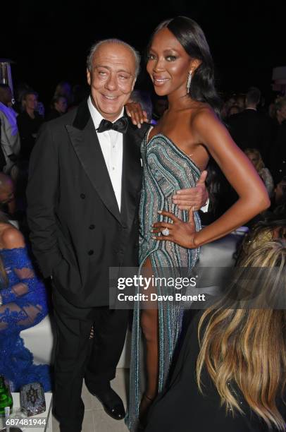 Fawaz Gruosi and Naomi Campbell attend the de Grisogono "Love On The Rocks" party during the 70th annual Cannes Film Festival at Hotel du...