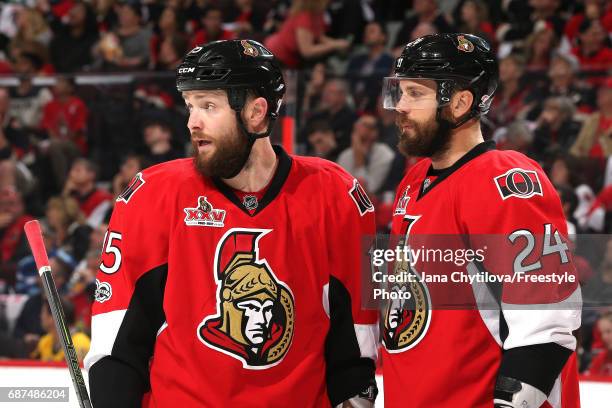 Zack Smith and Viktor Stalberg of the Ottawa Senators talk during a break in play against the Pittsburgh Penguins of the first period in Game Six of...