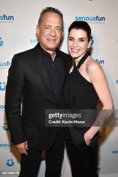Actors Tom Hanks and Julianna Margulies attend the SeriousFun Children's Network Gala at Pier 60 on May 23, 2017 in New York City.
