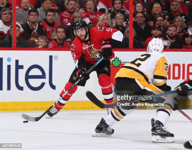 Bobby Ryan of the Ottawa Senators stickhandles the puck away from Mark Streit of the Pittsburgh Penguins in Game Six of the Eastern Conference Final...