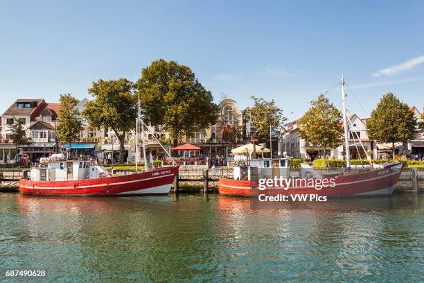 Fishing boats, Doberan and Hanno Gunther, Alter Strom Canal, and Am Strom street, Warnemunde, Germany.