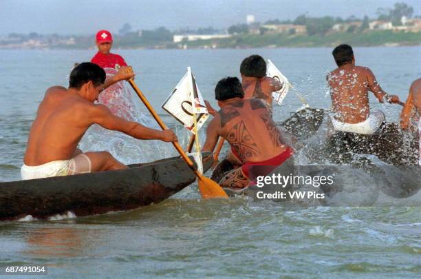 Indian in action at Tocantins river during indian olympic games in Maraba northern of Brazil.