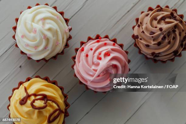 varieties of cupcakes - buttercream stock pictures, royalty-free photos & images